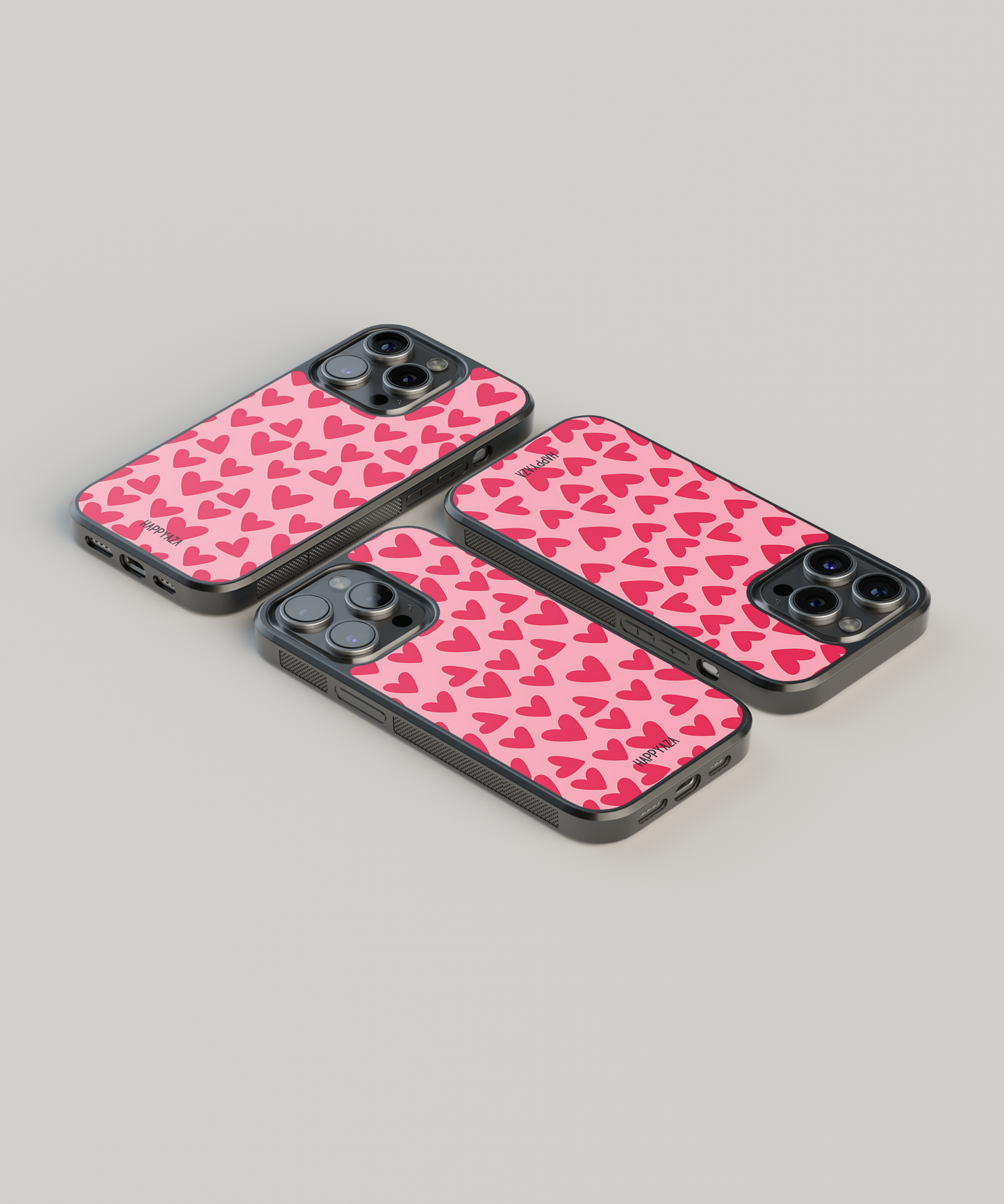 Red Hearts Are Lined Up On A Pink Background Designer Phone Case