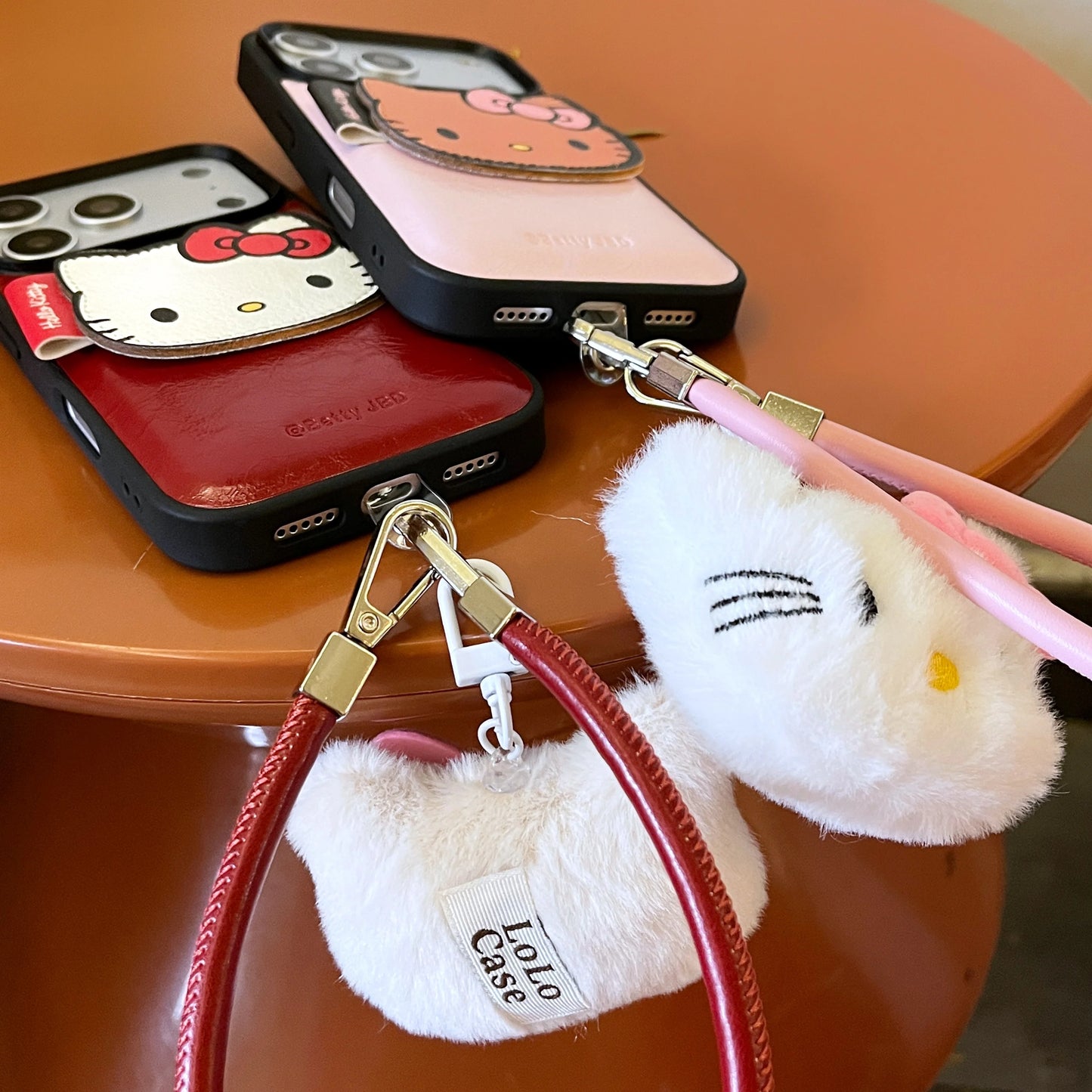 luxury Hello-Kitty vibes & leather finish Phone Case With Charm Strap