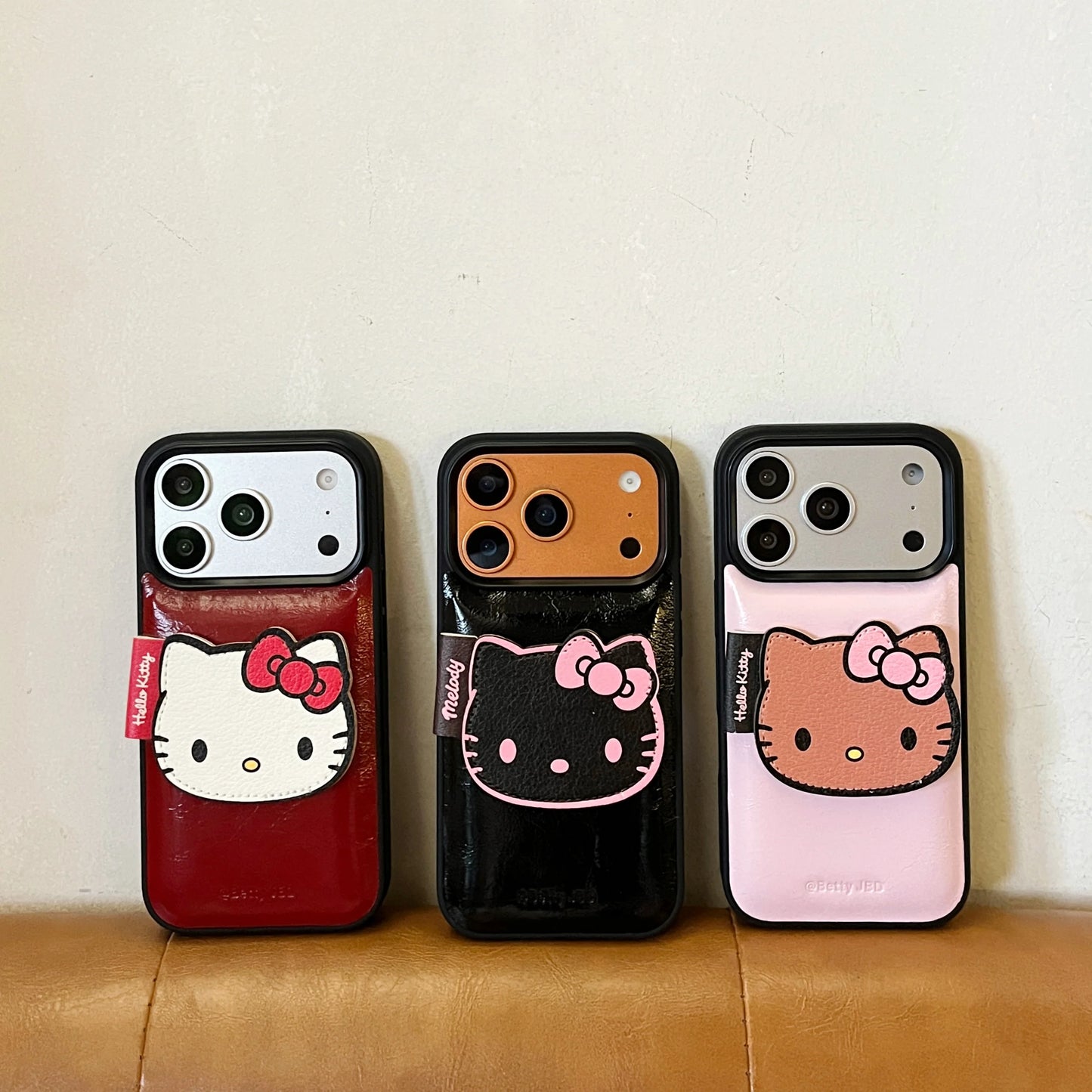 luxury Hello-Kitty vibes & leather finish Phone Case With Charm Strap